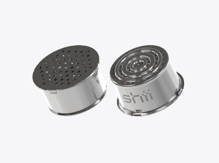 Zwei wiederverwendbare Metallköpfe